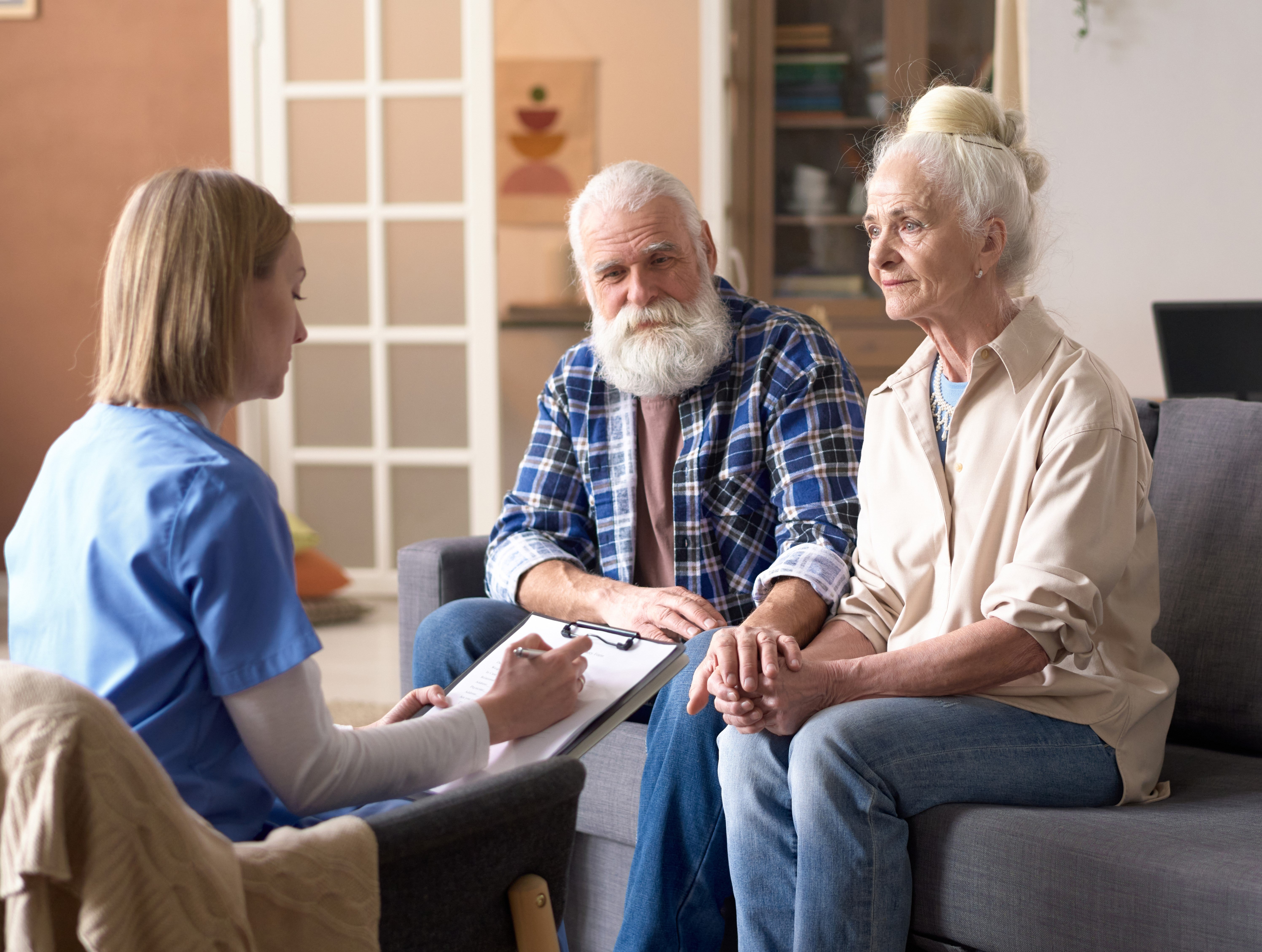 Photo of patient listening to doctor